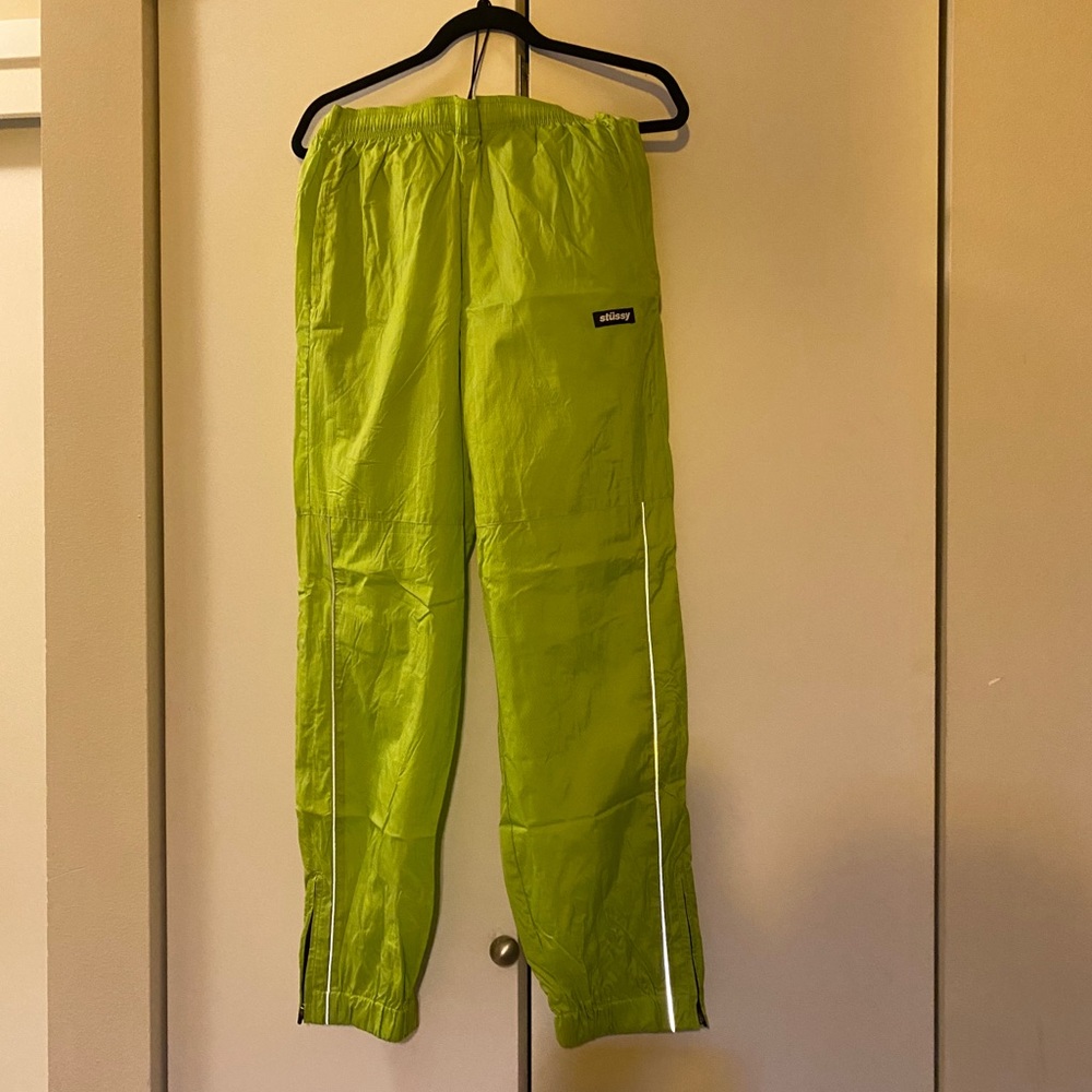 Neon green track pants